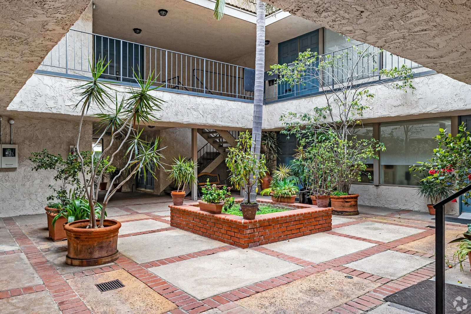 Mixed-use building photo — retail ground floor