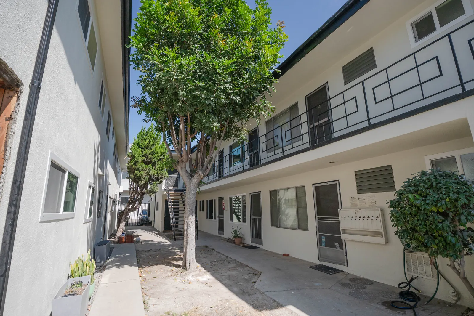 Multifamily building with walkway and balconies