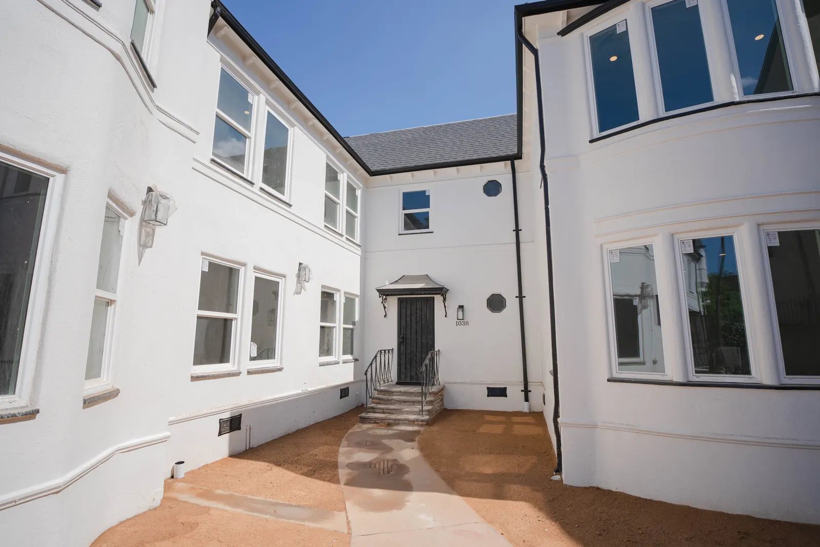 Renovated multifamily building and courtyard